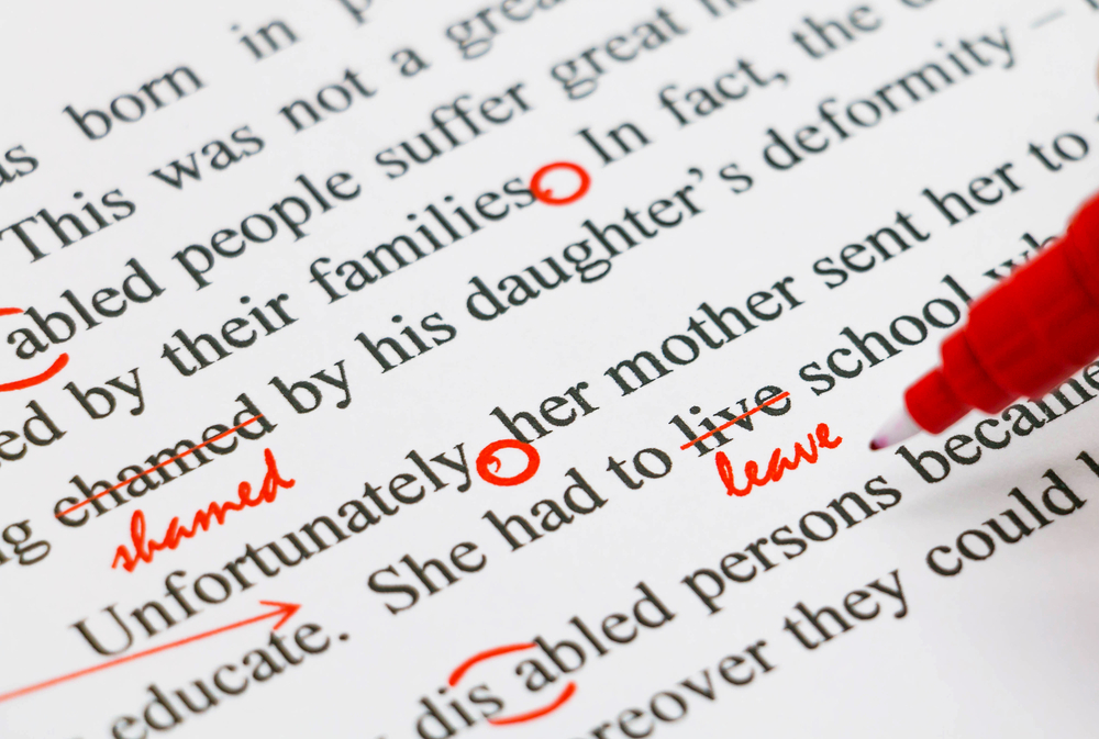 Closeup,Red,Marks,On,Proofreading,English,Document